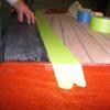 Masking with multiple layers of tape to prevent cross grain on decks