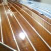 Removing tape from decks where lines were painted