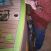 Taking extra care by sanding carefully along the top of the transom to ensure cross-grain does not occur
