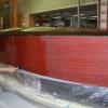 Putting on 7th coat of varnish