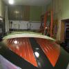 Putting on 7th coat of varnish