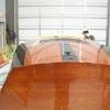 Putting on 7th coat of varnish